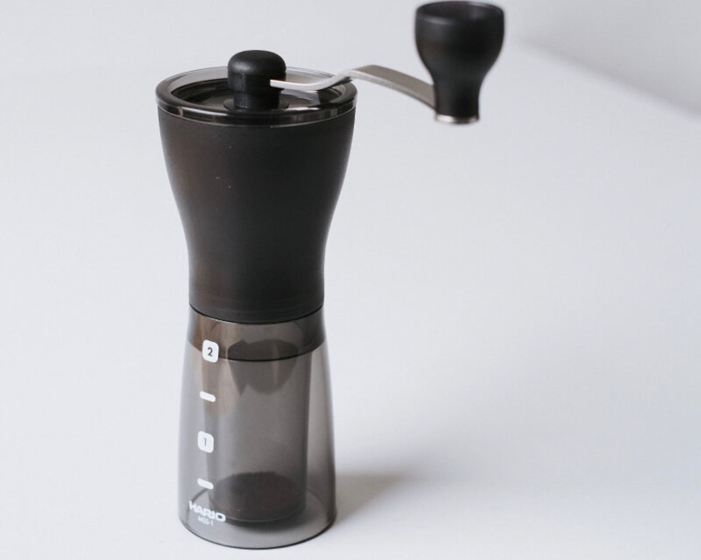 Hario Ceramic Coffee Mill Mini-Slim Plus lifestyle 1 11